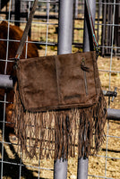 The Zigg Adjustable Cowhide Tooled Purse