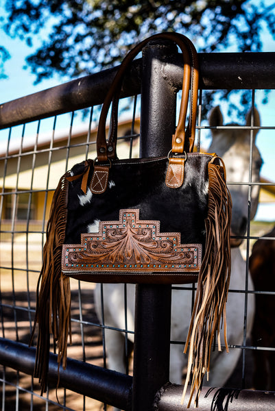 The Miss Peaches cowhide purse